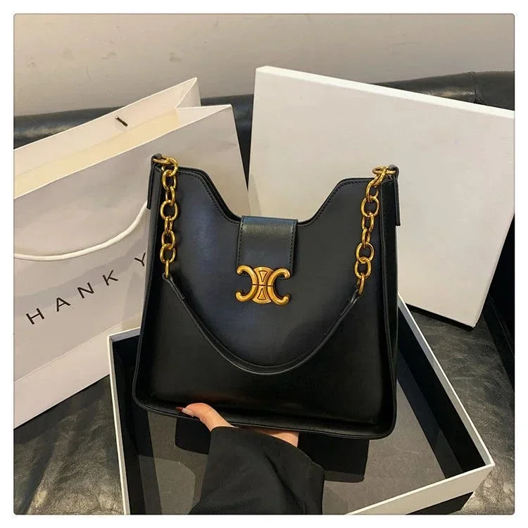 Medium Bucket Louise bag, smooth calfskin - black & suede calfskin - blonde