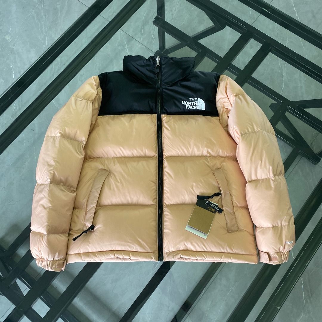 The North Face 1996 Nuptse Jacket in Soft Lotus Pink